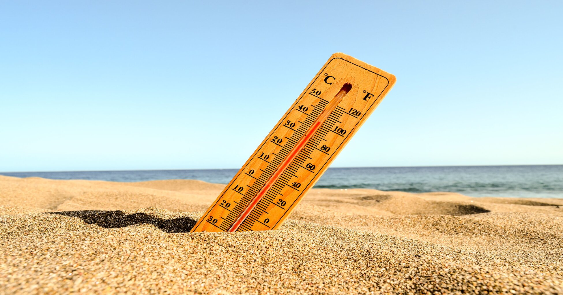 rsz_a-closeup-shot-of-a-thermometer-in-the-beach-sand
